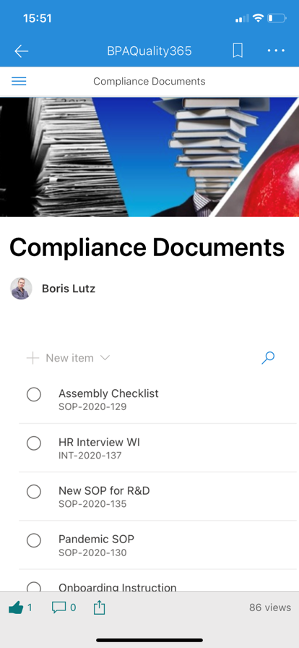 Accessing compliance documents with a phone.